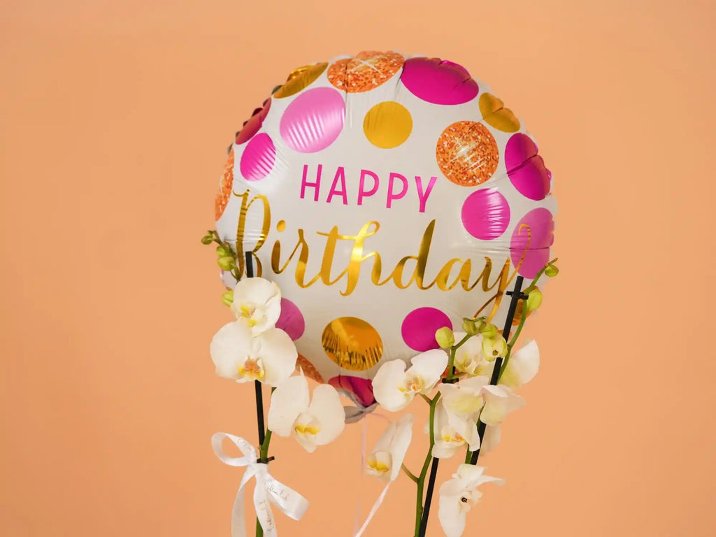 Close-up of Birthday Orchid Bundle – premium orchid and curated birthday gifts for a luxurious celebration