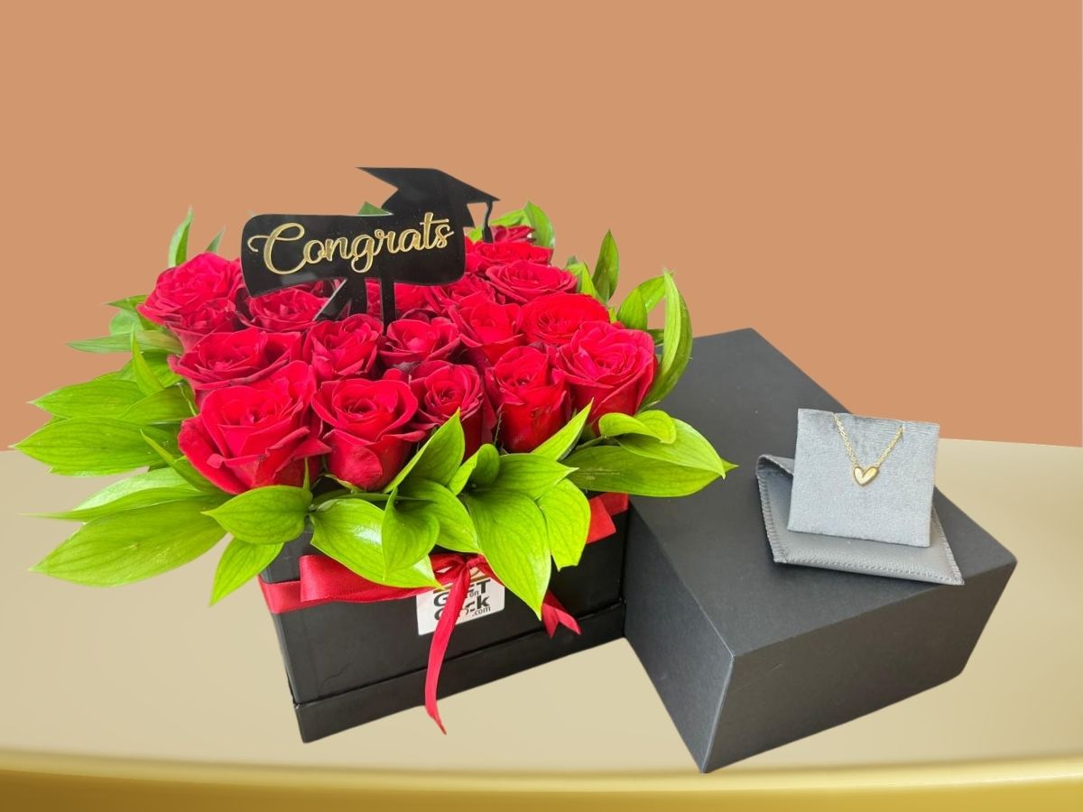 Glorious graduation bundle with fresh red roses box, congrats topper and gold plated necklace