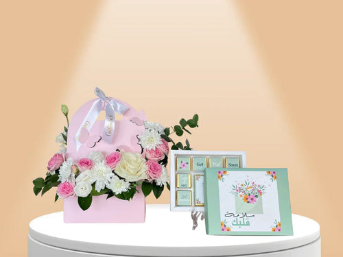 Get well soon gift | get well soon gifts Dubai | get well soon chocolate UAE | get well soon hamper Dubai | get well soon flowers Dubai | themed chocolate box UAE | fresh flowers Dubai | fresh flower arrangement Dubai | fresh flowers for newborn UAE | flower and chocolate gift Dubai | Salamet Albak Flowers & Chocolates Bundle UAE | Salamet Albak Flowers & Chocolates UAE | fresh roses gift UAE | pastel pink gift box Dubai | uplifting chocolate gift UAE | floral gift hamper Dubai | premium chocolate box Dubai