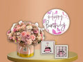 Floral arrangement in a box, 'Happy Birthday' balloon, and a Happy Birthday chocolate box 