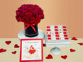 The Love Bundle- red roses box, a box of chocolates on a beige surface with heart decorations-Gift delivery Lebanon
