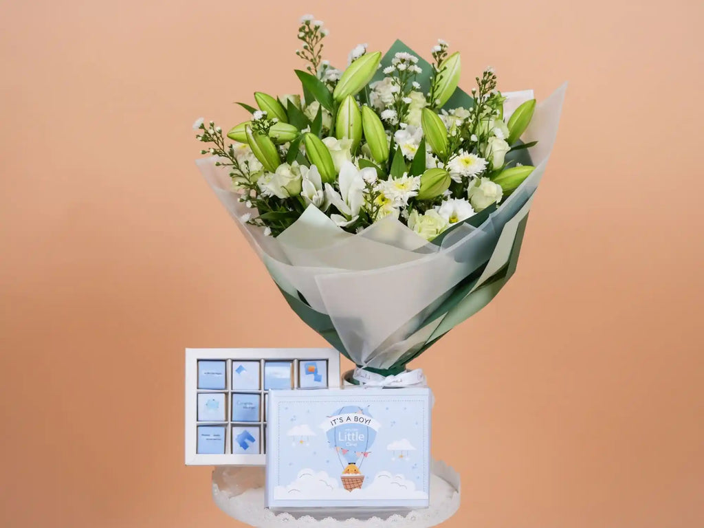Welcome Baby Boy Bundle with 12 piece chocolate box and fresh flower arrangement- Gift On Click Lebanon