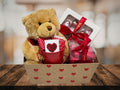 gift box with teddy bear and heart chocolates