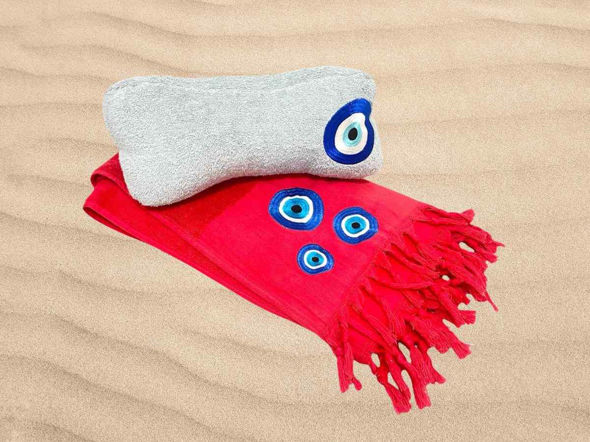 beach pillow and towel set with evil eye embroidery