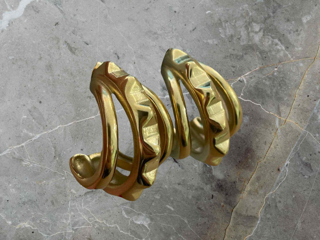 Gold earrings with stud design