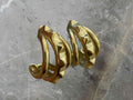 Gold earrings with stud design