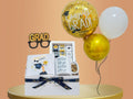 gift for graduation with balloons, chocolate box, mugand topper