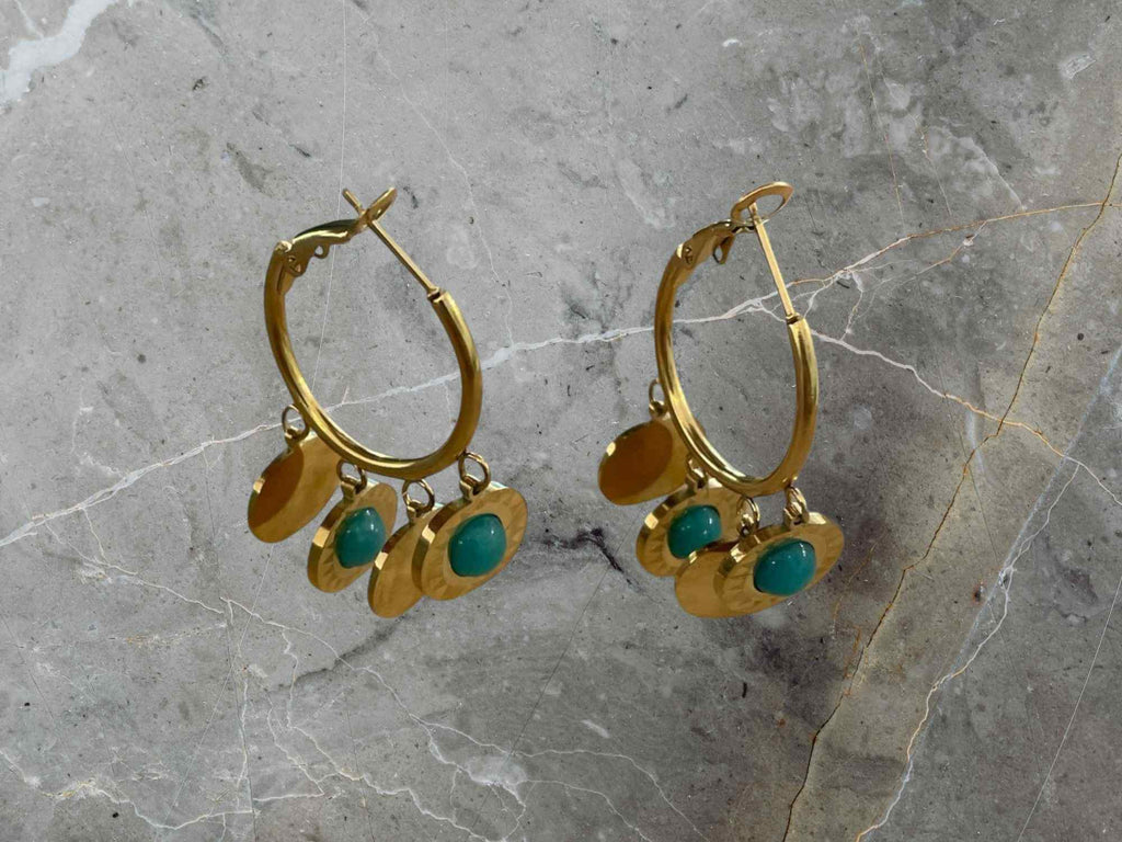gold earrings with turquoise stones