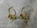 gold earrings with turquoise stones