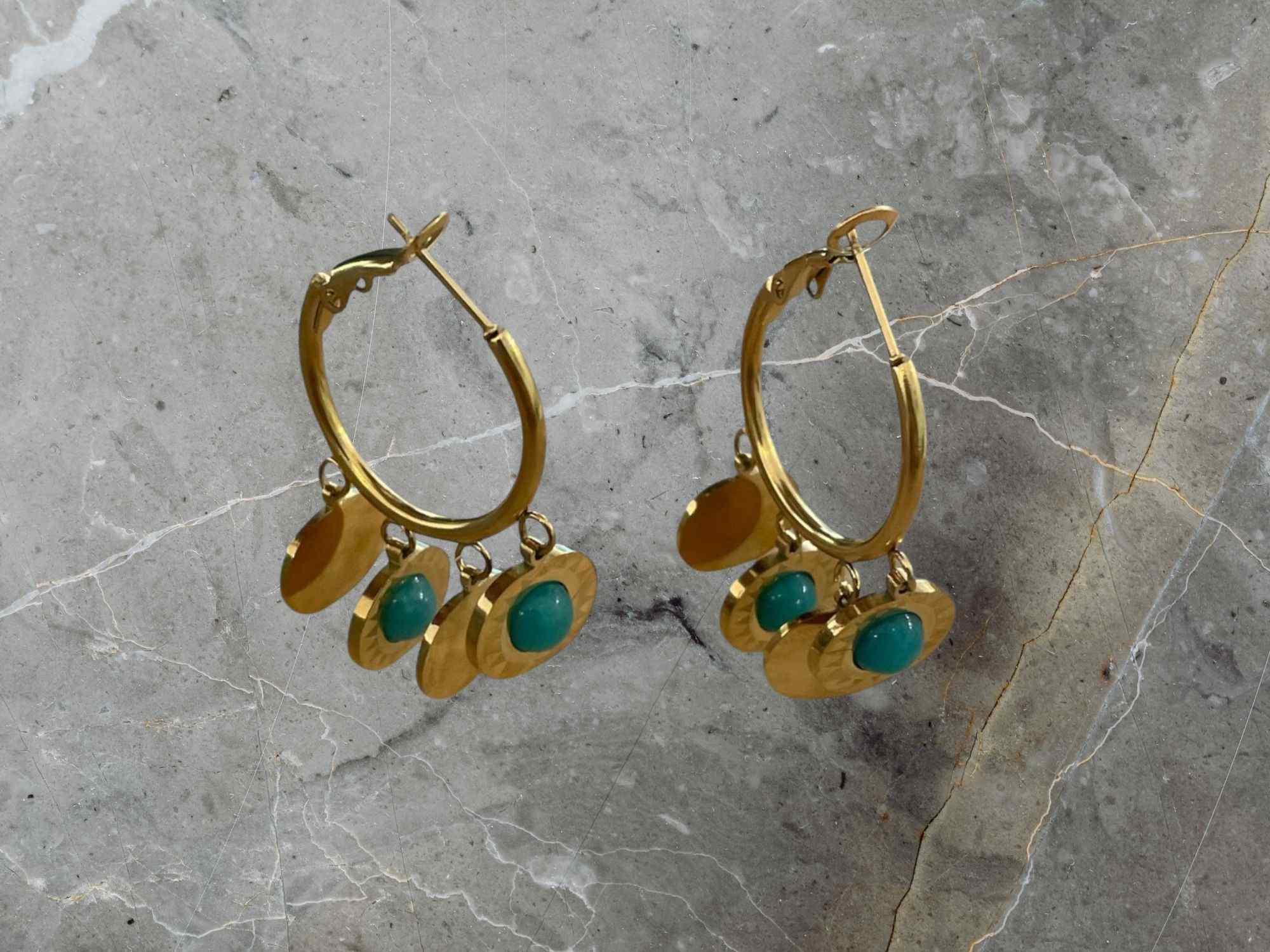 gold earrings with turquoise stones