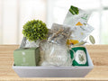 giftbox with tea mug, tea sifter, tea leaves, face masks, green plant, green candle, face roller and traditional lebanese soap
