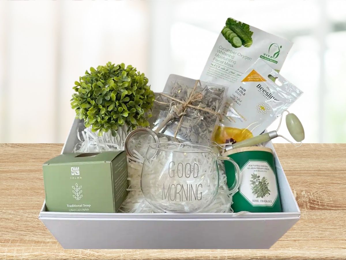 giftbox with tea mug, tea sifter, tea leaves, face masks, green plant, green candle, face roller and traditional lebanese soap