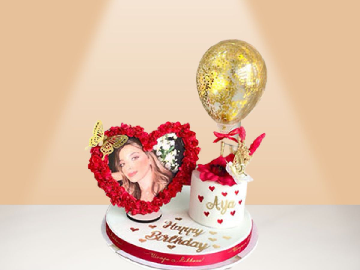 cake with balloon and heart frame photo