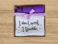 embroidered gym towel and purple gym bottle