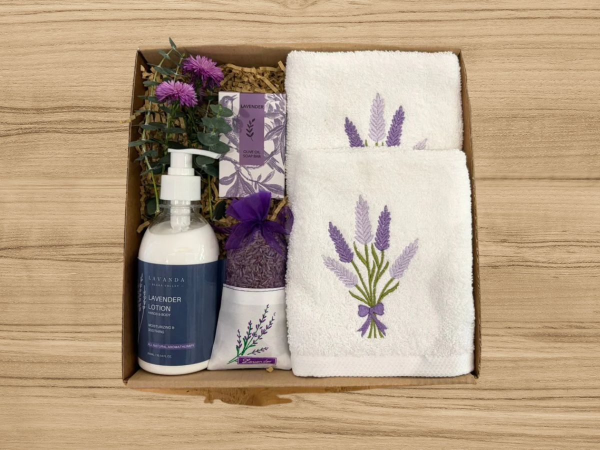 giftbox with lavender embroidered towels, lavender lotion, lavender buds and soap