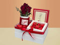 Giftable box with red roses, mug, and i love you chocolates 