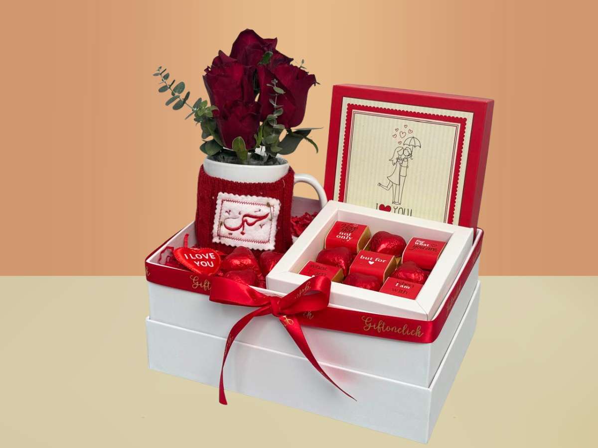 Giftable box with red roses, mug, and i love you chocolates 