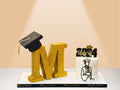 graduation cake with letter