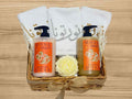 embroidered hand towels, body lotion and hand wash set with decorative candle