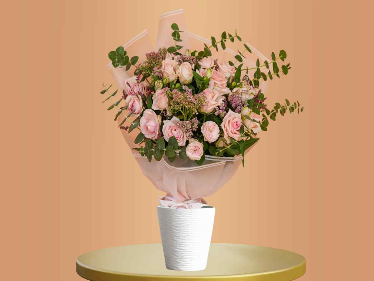 bouquet with pink roses and accessory flowers