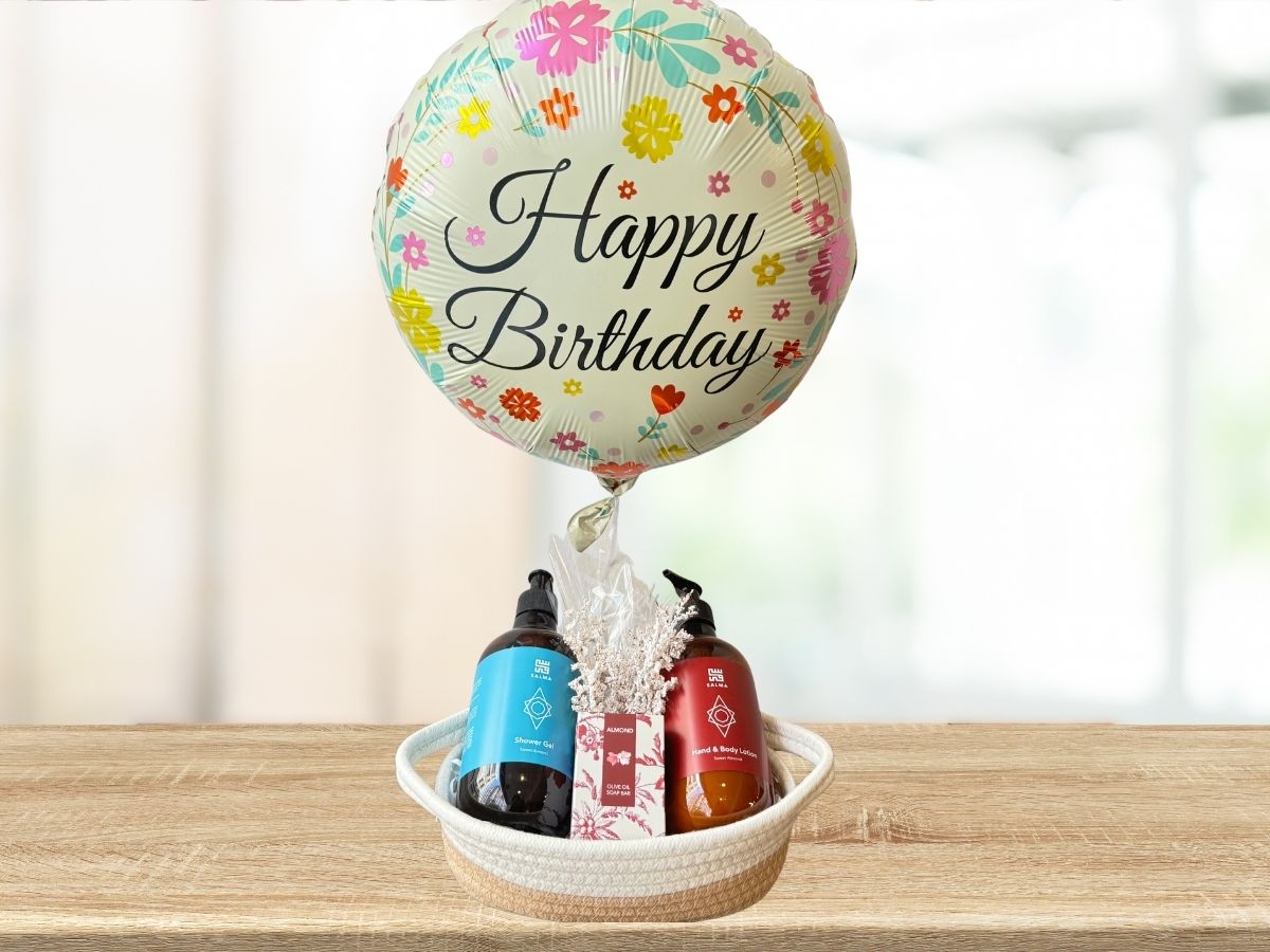 gift basket with hand wash, body lotion and soap bar set and birthday balloon