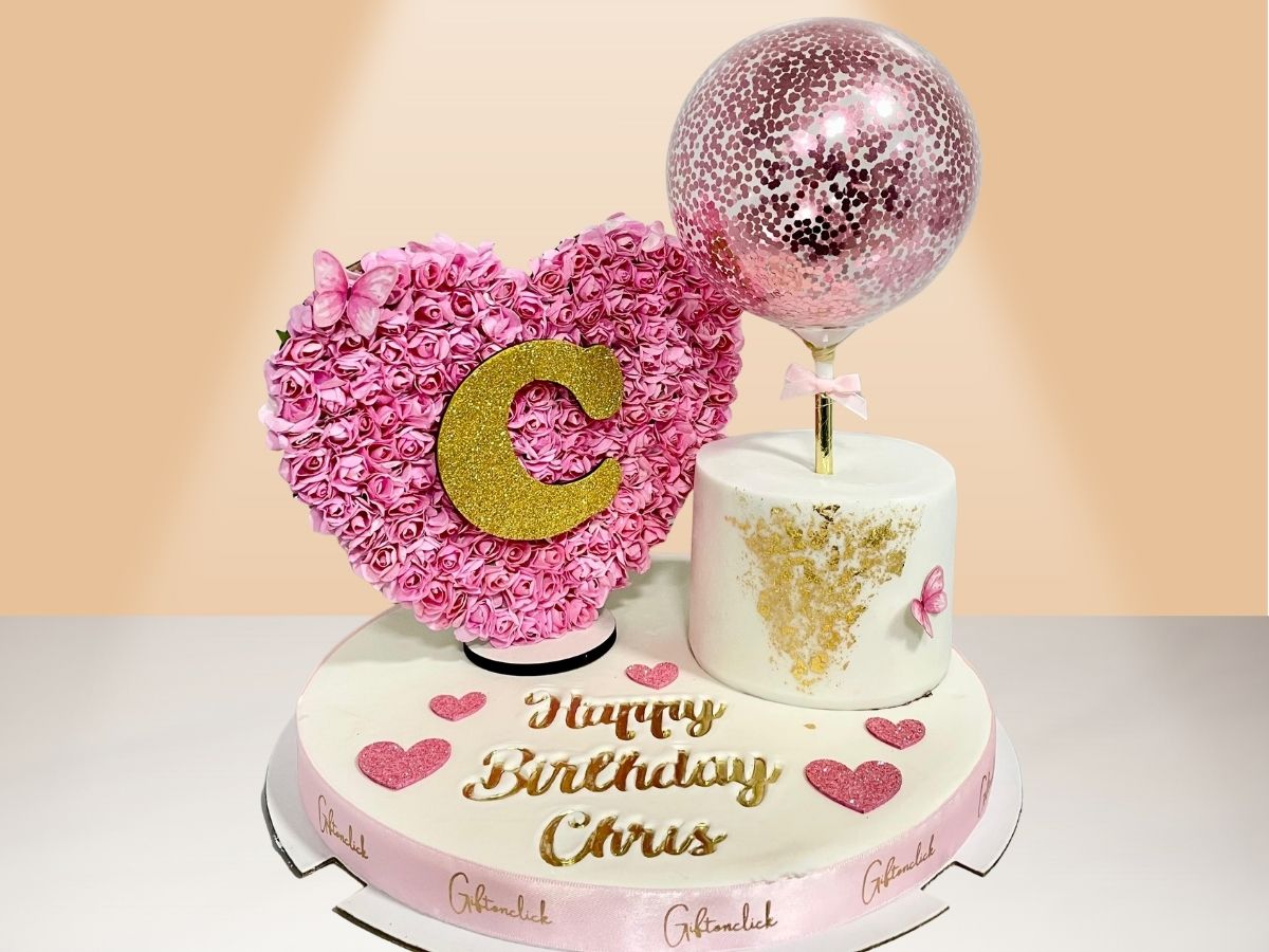 single cake, balloon and flower heart