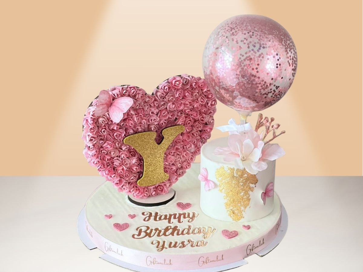 single cake, balloon and flower heart