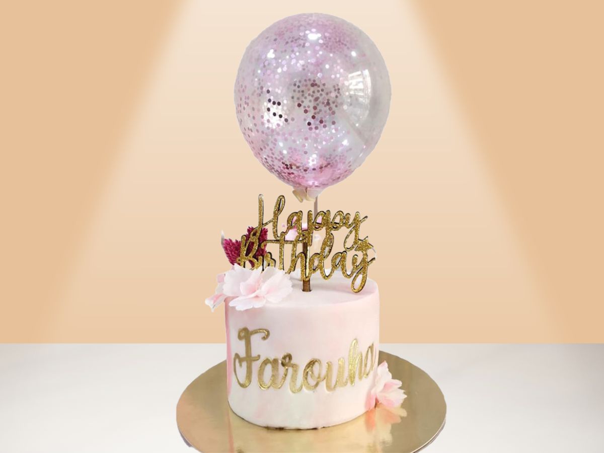 cake with confetti balloon