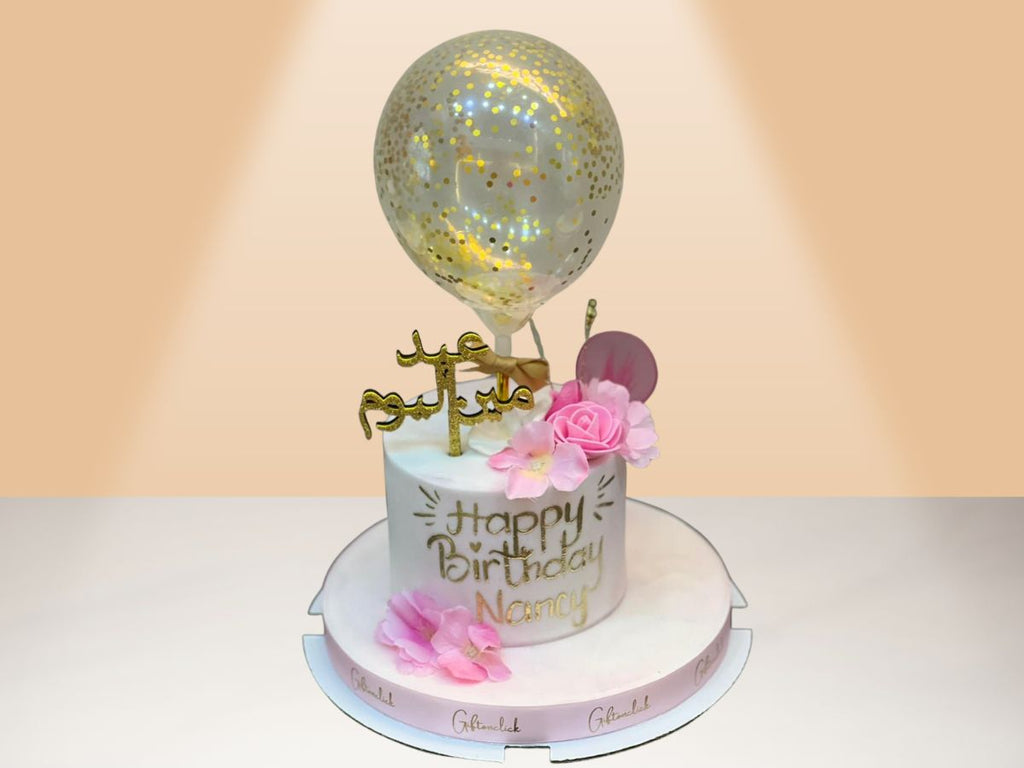 cake with confetti balloon