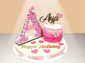 single ruffle cake with flower letter