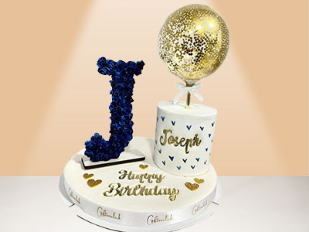 small cake with flower letter