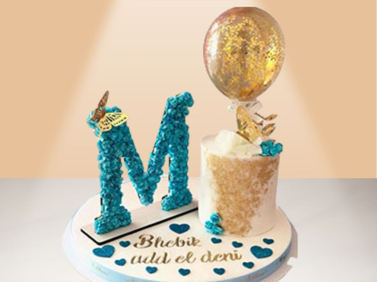 small cake with flower letter