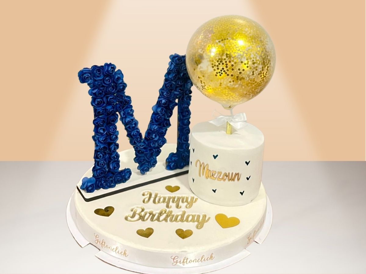 small cake with flower letter