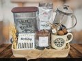 gift tray with french press, coffee blend, coffee canister, chocolate bar, nuts, coffee mug and candle