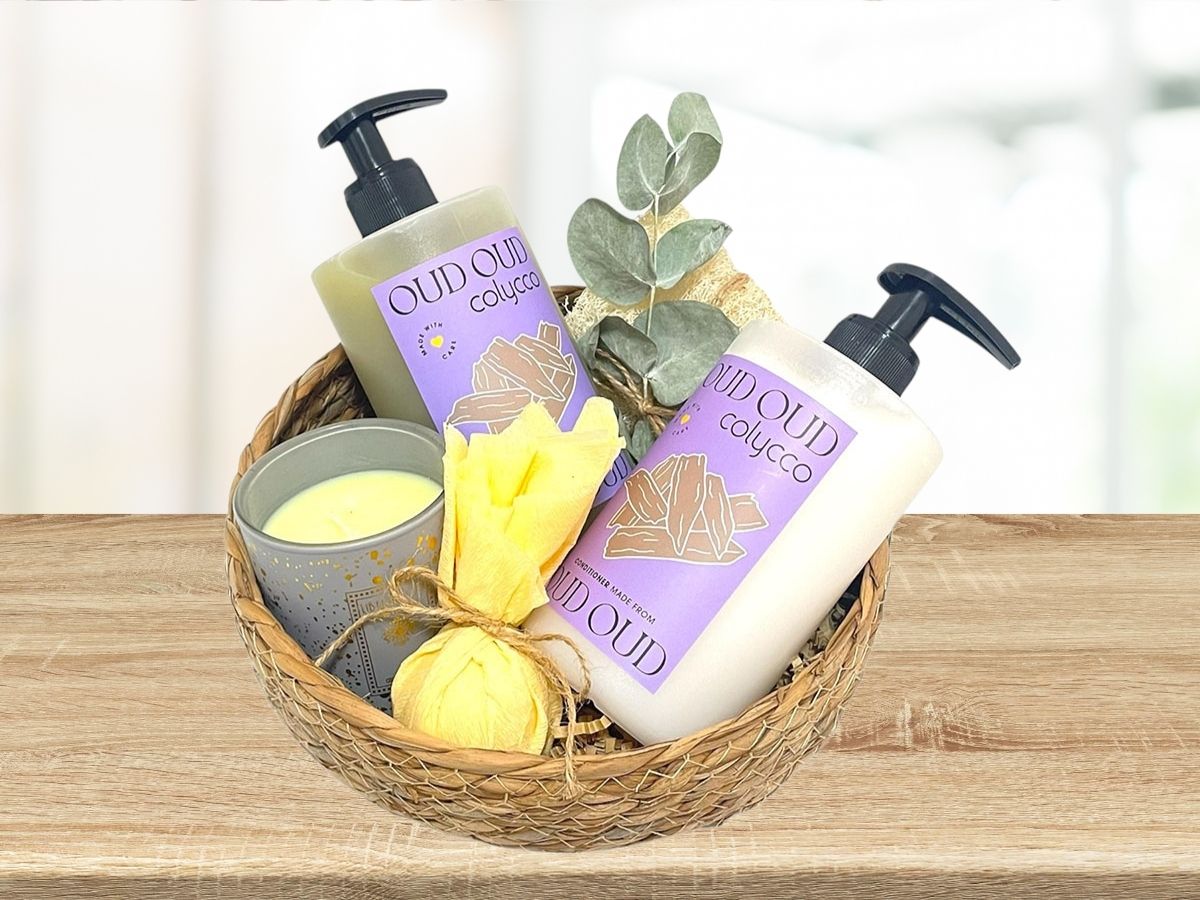 gift basket with shampoo and conditioner set, bath bomb, candle and lufa