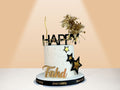 birthday cake with gold black and white colors