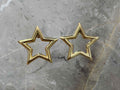 Gold star-shaped earrings 