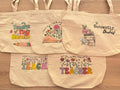 beige tote bags with colorful text and graphics for teachers