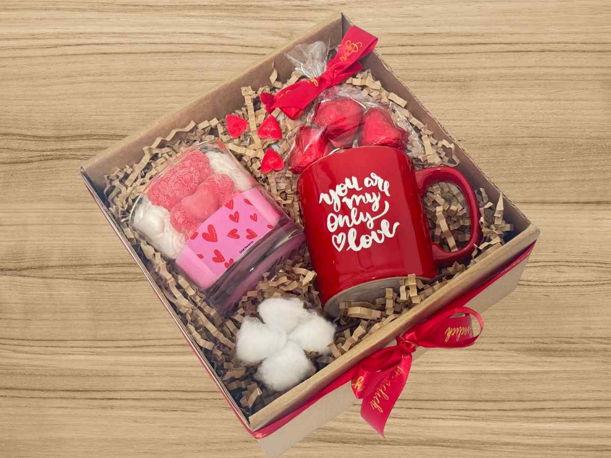 gift box with love mug, heart chocolates and love themed candle