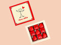 Box of red heart-shaped chocolates for her
