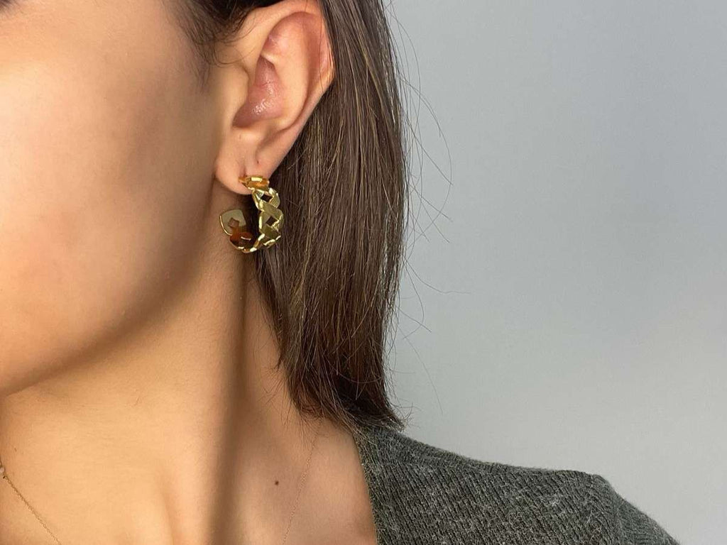 gold hoop earring with weave design