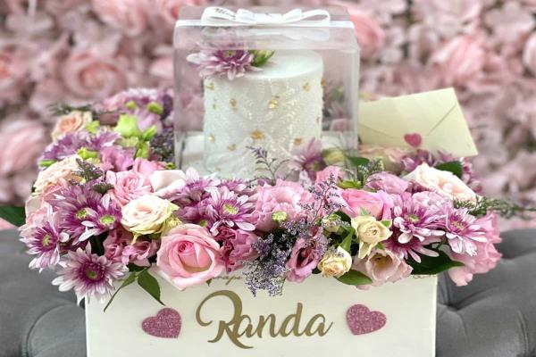 Arrangement of Mixed Flowers In White Box With Cake
