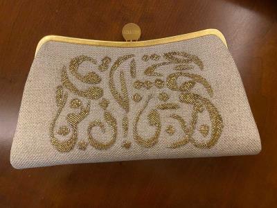 Gold Calligraphy Clutch