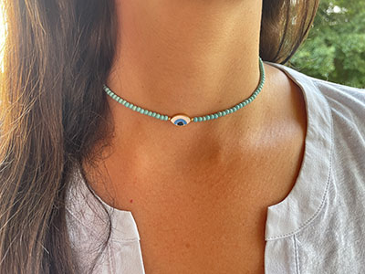 Turquoise Beads & Eye Pendant Necklace